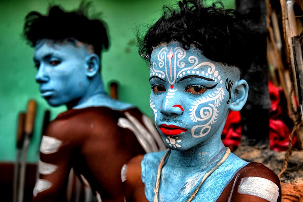 Blue Painted Indian Faces by Avishek Das — canvas wall art
