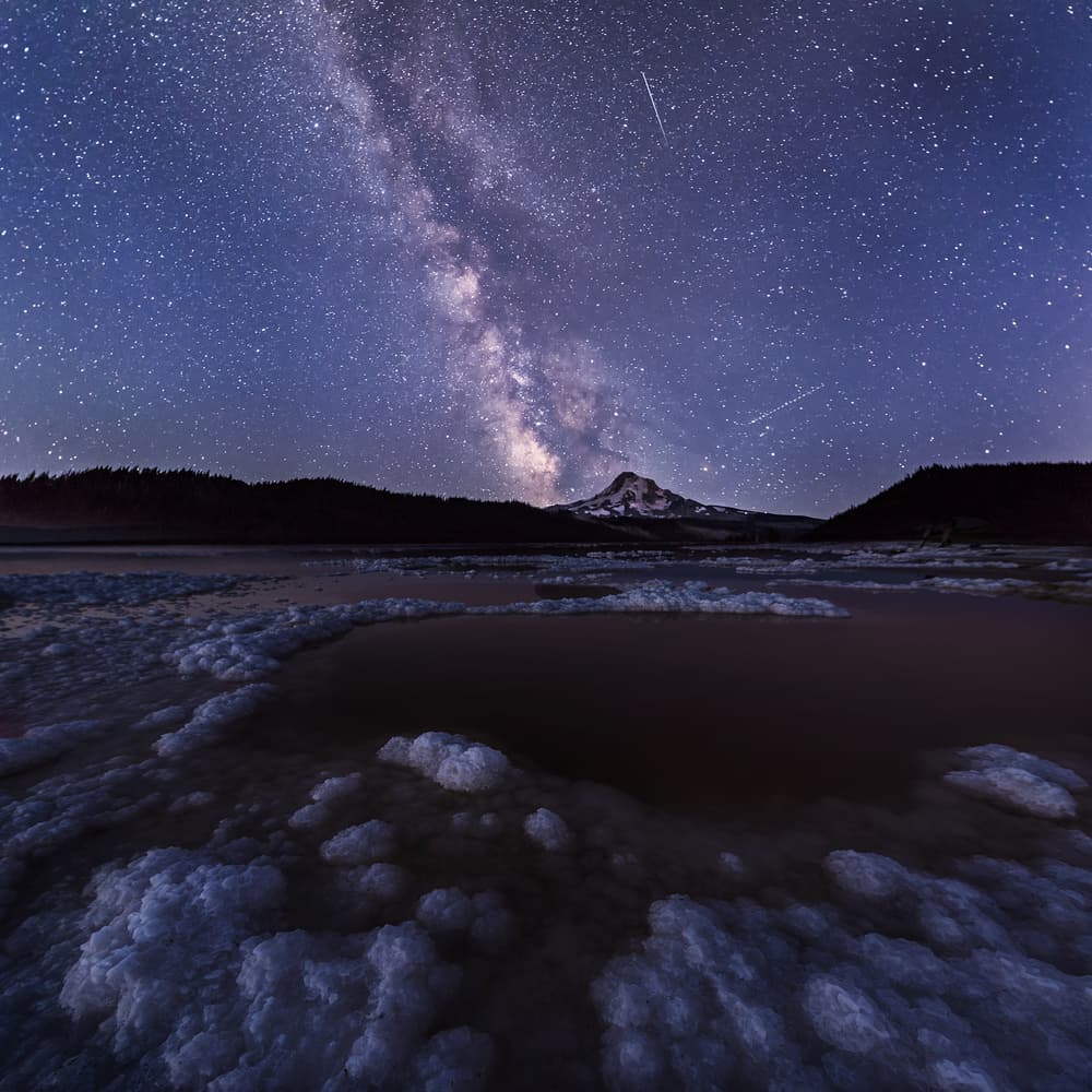 Milky Way Over Frozen Lake by Annie Poreider — canvas wall art