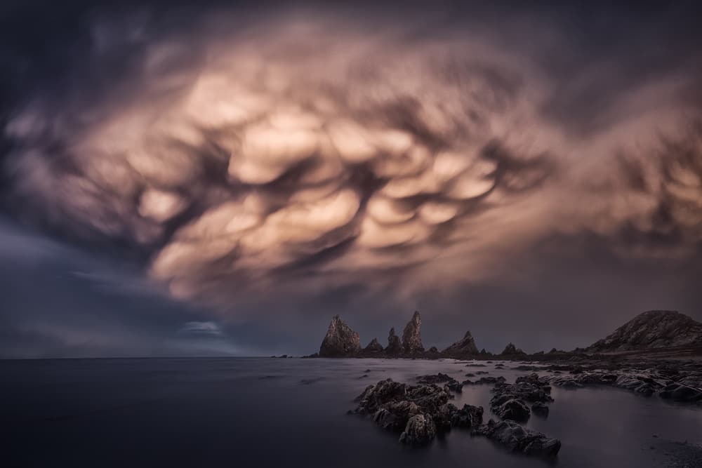 Mammatus Clouds Coast by Carlos F. Turienzo — canvas wall art