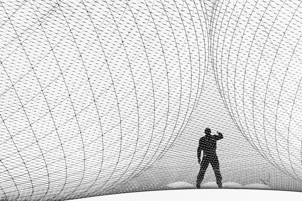 Man Under The Grid by Luc Vangindertael (laGrange) — canvas wall art