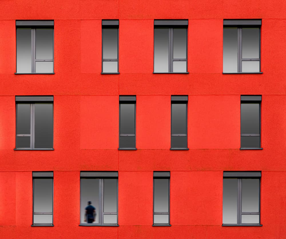 Man in Red Window by Roland M Schwerdtfeger — canvas wall art