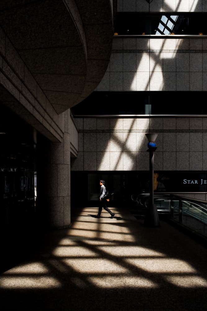 Man in Geometric Shadows by Yohei Kawashima — canvas wall art