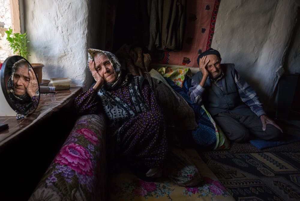 Elderly Couple Reflection by durmusceylan — canvas wall art
