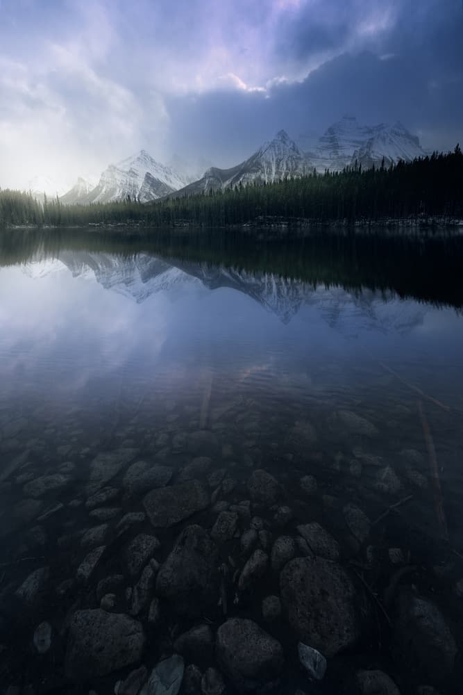 Moody Mountain Reflection by David Martin Castan — canvas wall art