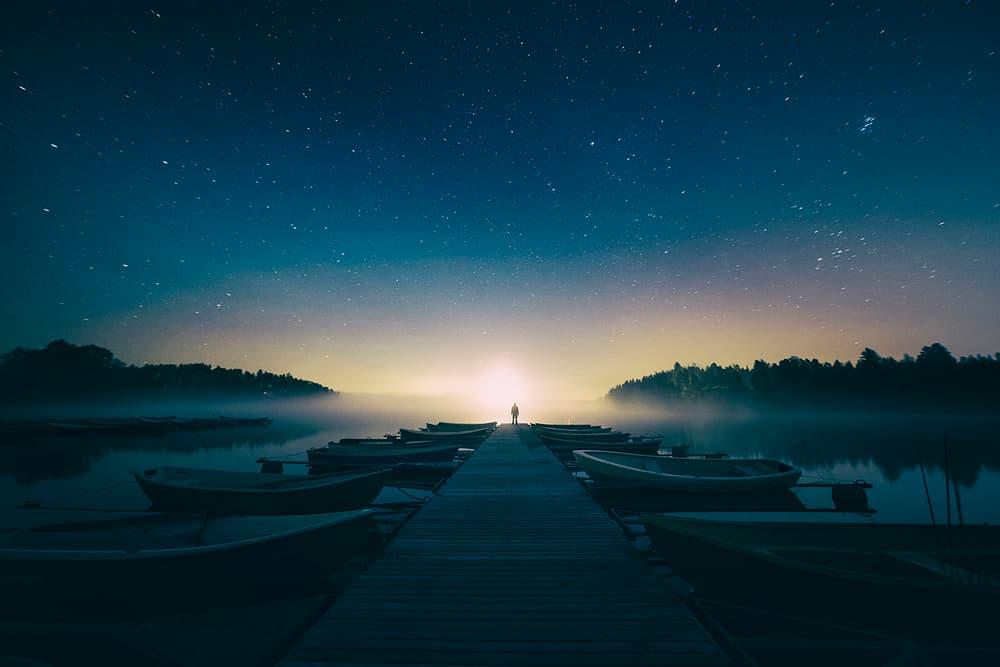 Misty Lake Under Stars by Mika Suutari — canvas wall art