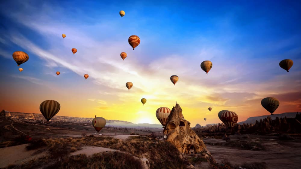 Sunrise Hot Air Balloons by Merthan Kortan — canvas wall art