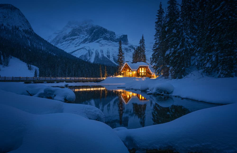 Cozy Cabin Snow Reflection by Ruiqing P. — canvas wall art