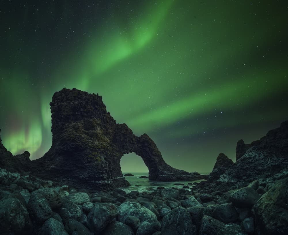 Northern Lights Sea Arch by David Martin Castan — canvas wall art