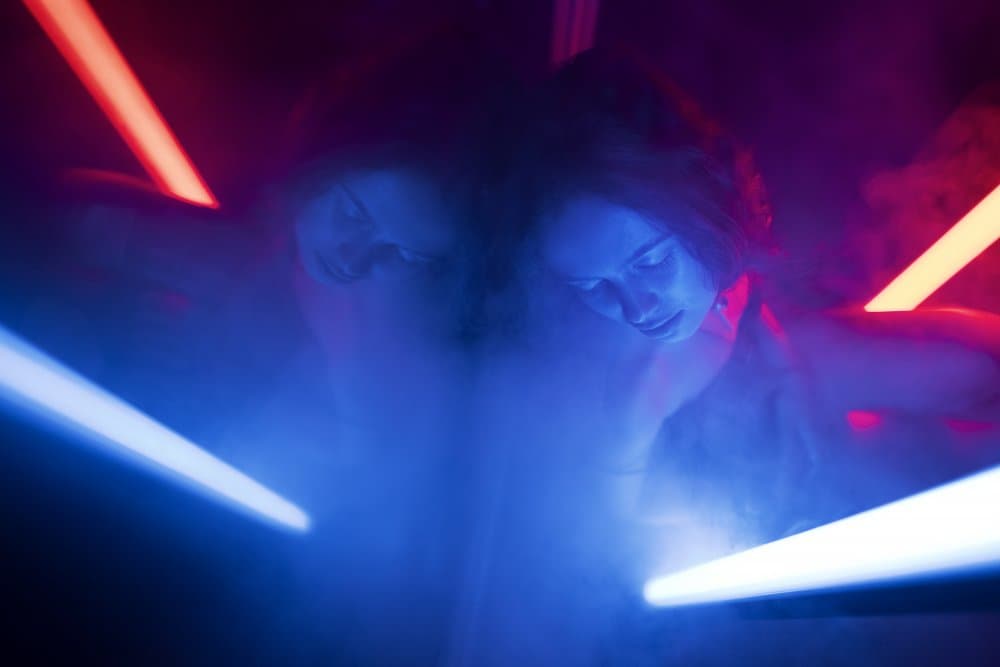 Woman in Neon Glow by Gina Buliga — canvas wall art