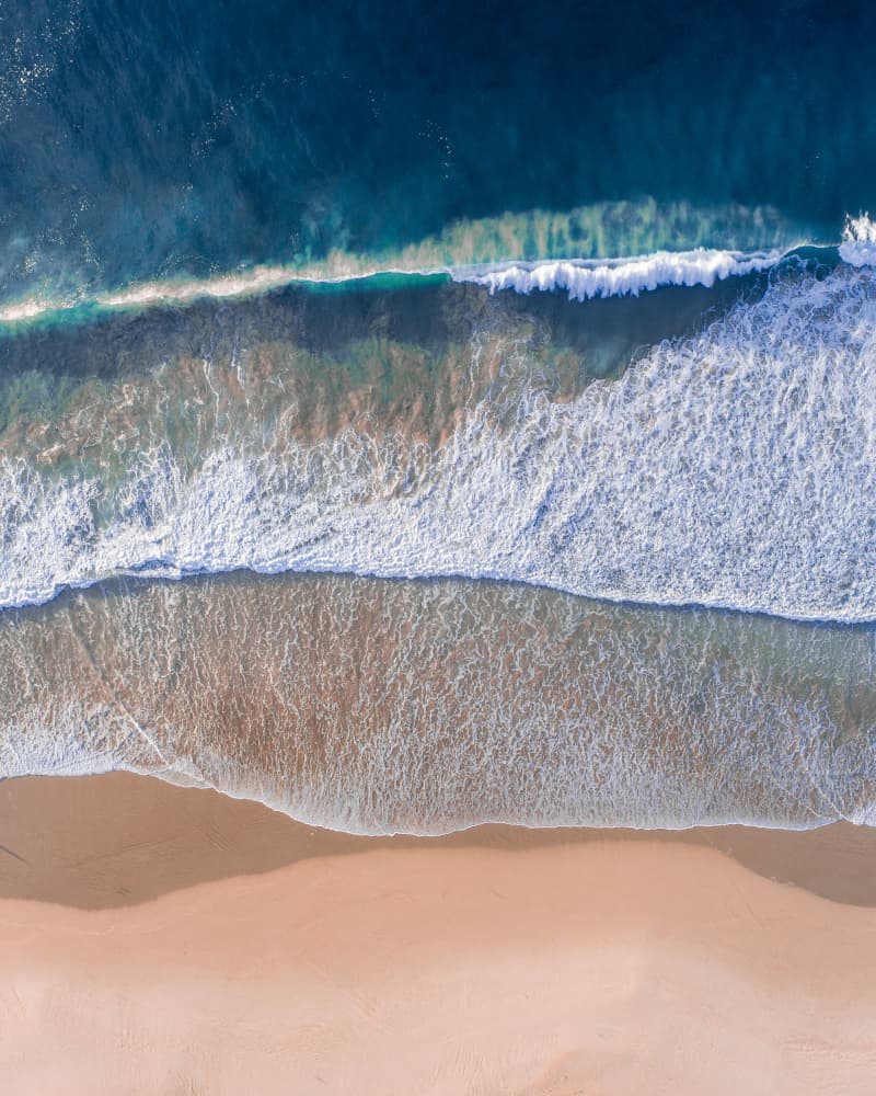 Turquoise Waves Sandy Beach by Ryan Warneke — canvas wall art
