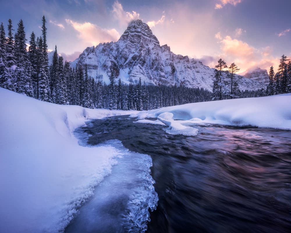 Snowy Mountain River Flow by Daniel Gastager — canvas wall art