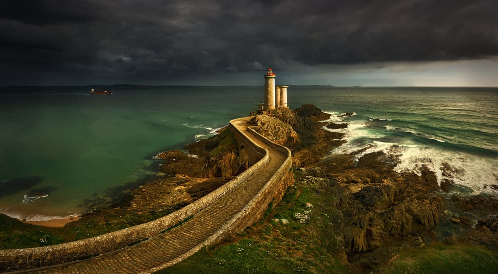 Stormy Coastal Lighthouse by Krzysztof Browko — canvas wall art
