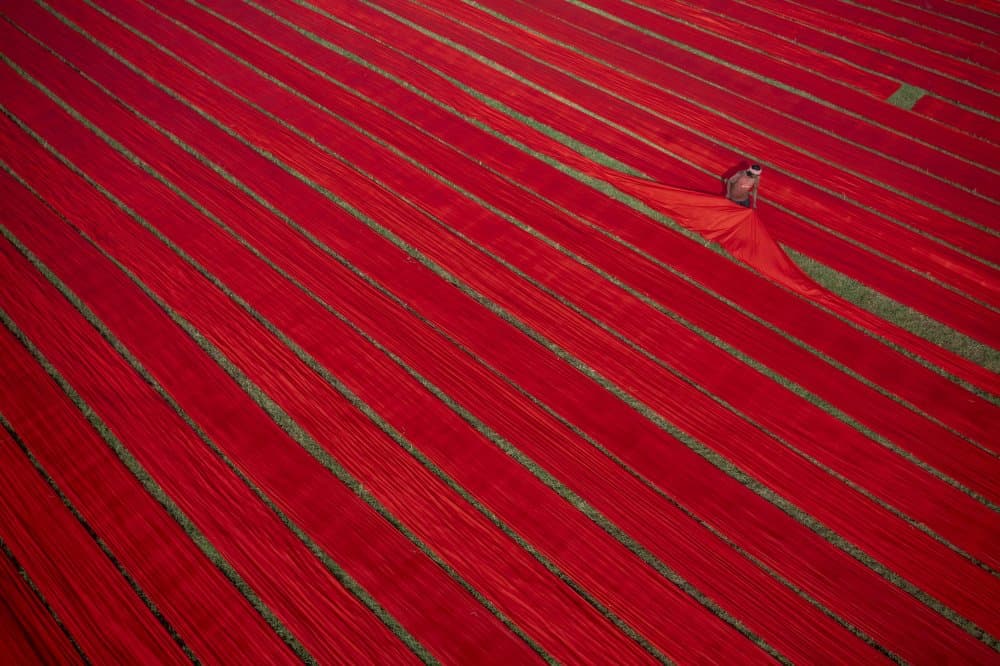 Red Fabric Fields by Azim Khan Ronnie — canvas wall art