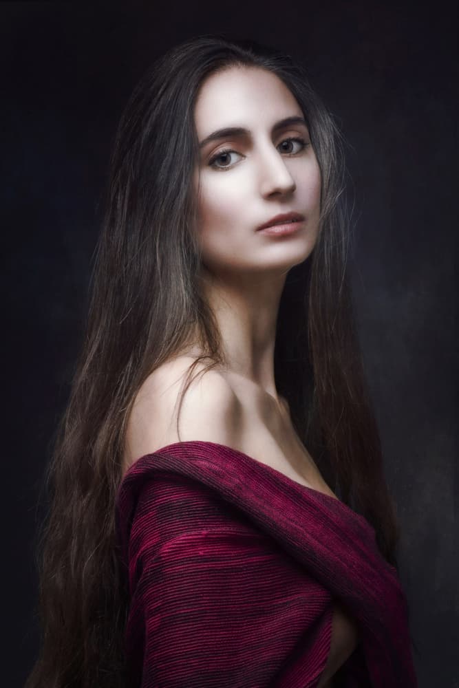 Pensive Woman Red Shawl by Jan Slotboom — canvas wall art