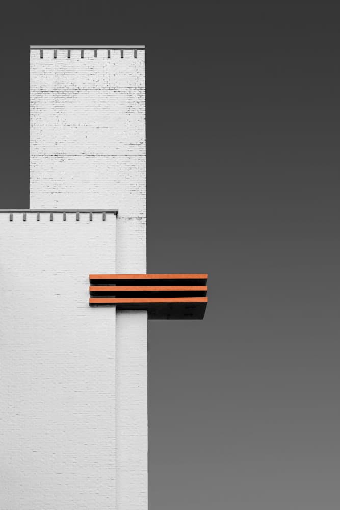 White Architecture Orange Accent by Rolf Endermann — canvas wall art