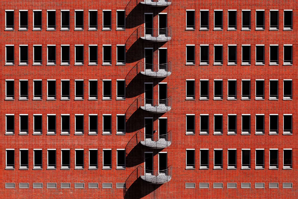 Geometric Red Facade by Hans-Wolfgang Hawerkamp — canvas wall art
