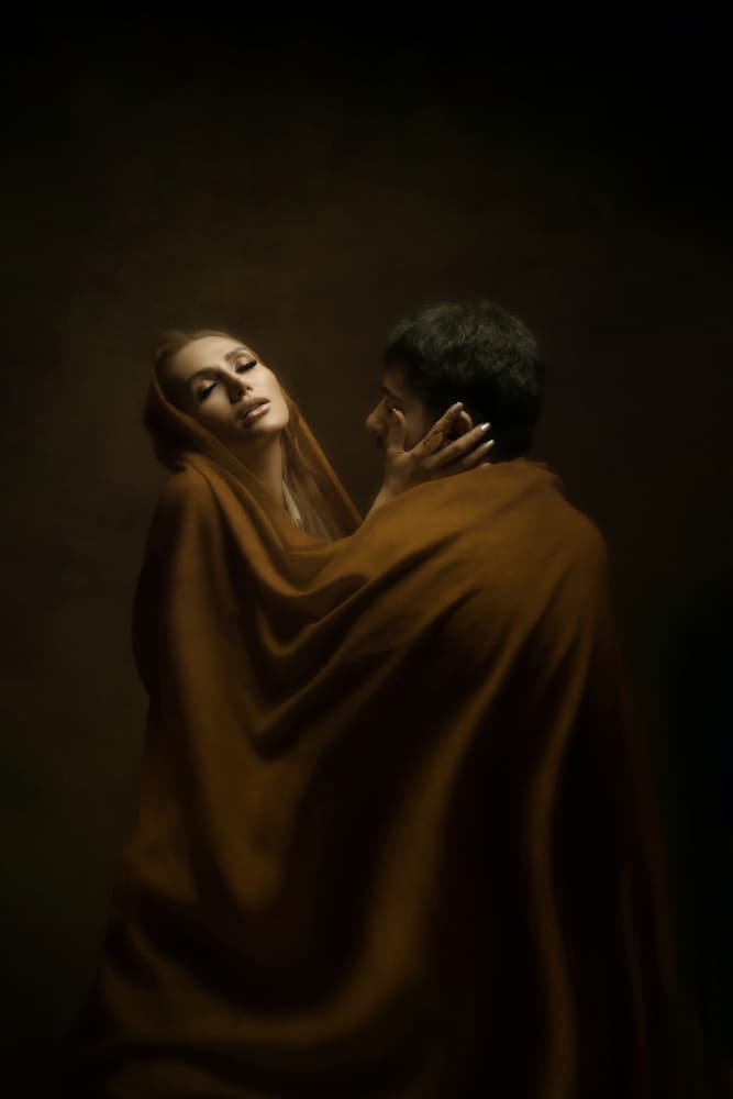 Intimate Couple's Embrace by Moein Hasheminasab — canvas wall art