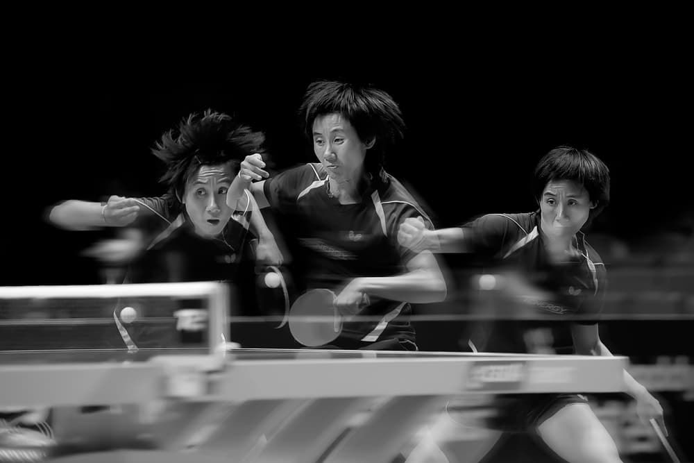 Intense Table Tennis Play by Rob Li — canvas wall art