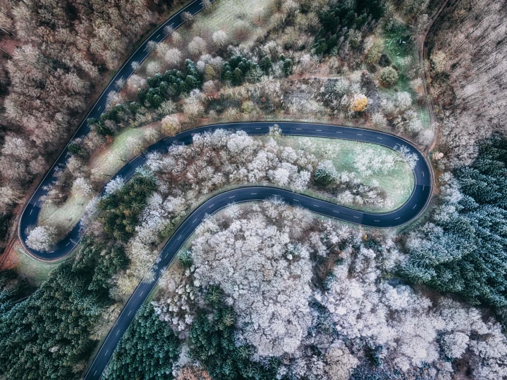 Winding Winter Road by Guy Krier — canvas wall art