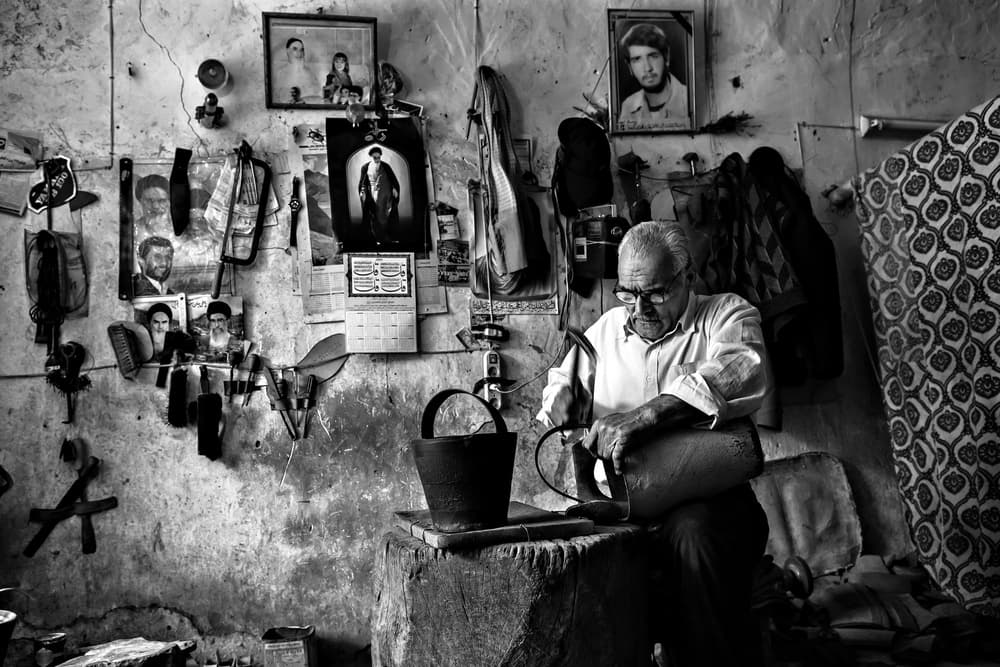 Elderly Artisan At Work by Mohammadreza Momeni — canvas wall art