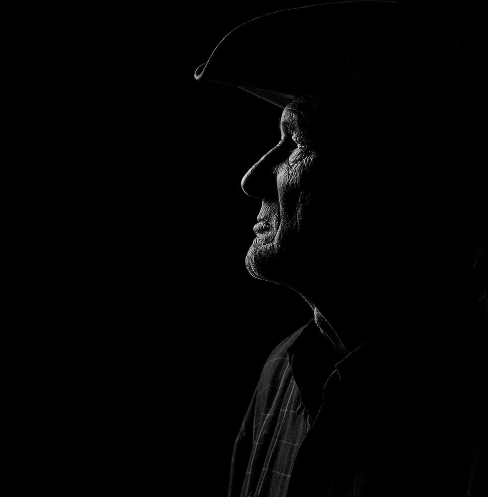 Man In Hat Profile by Claude Brazeau — canvas wall art