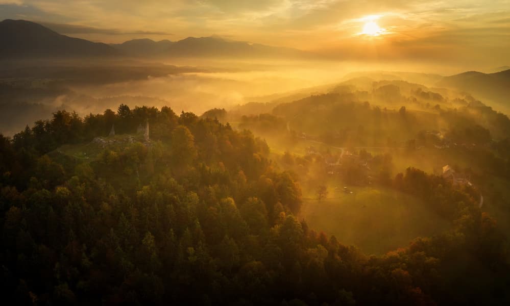 Golden Mist Castle Ruins by Ales Krivec — canvas wall art