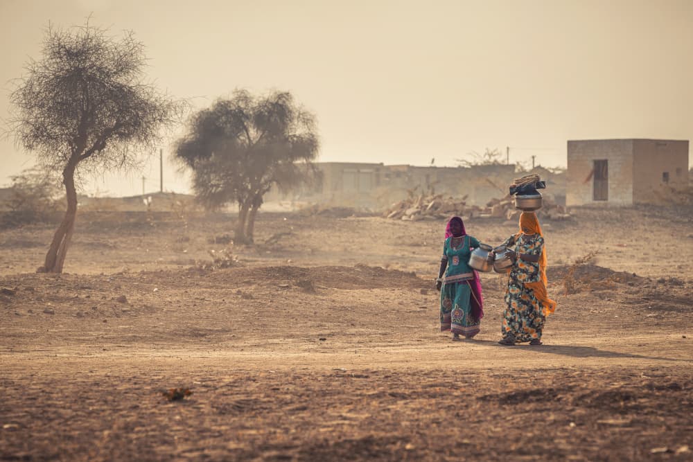 Desert Women Carrying Water by Milton Louiz — canvas wall art