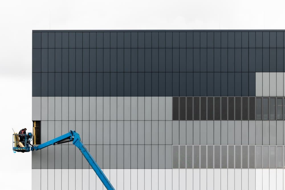 Worker on Modern Facade by Peter Pfeiffer — canvas wall art