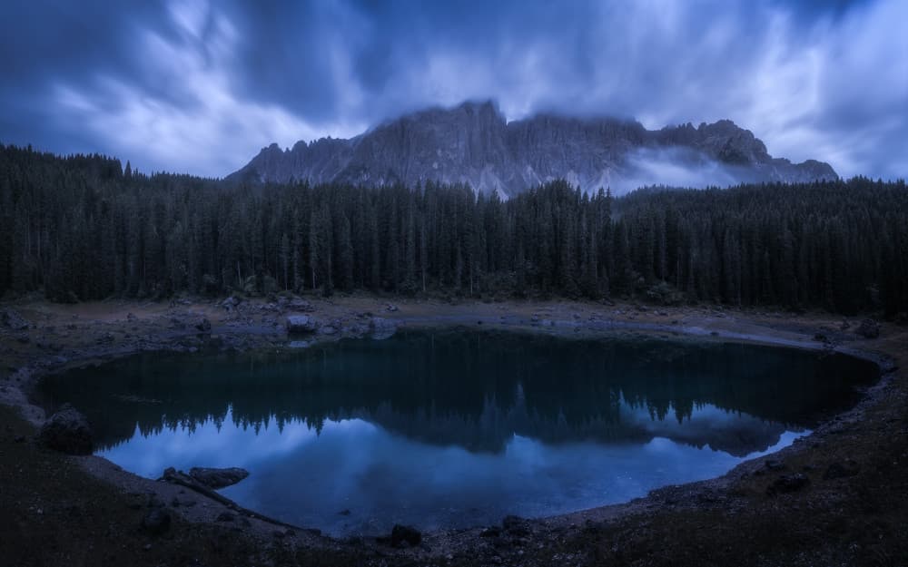 Moody Alpine Lake by Daniel Gastager — canvas wall art