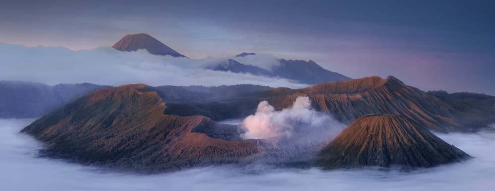 Misty Volcano Sunrise by Libby Zhang — canvas wall art