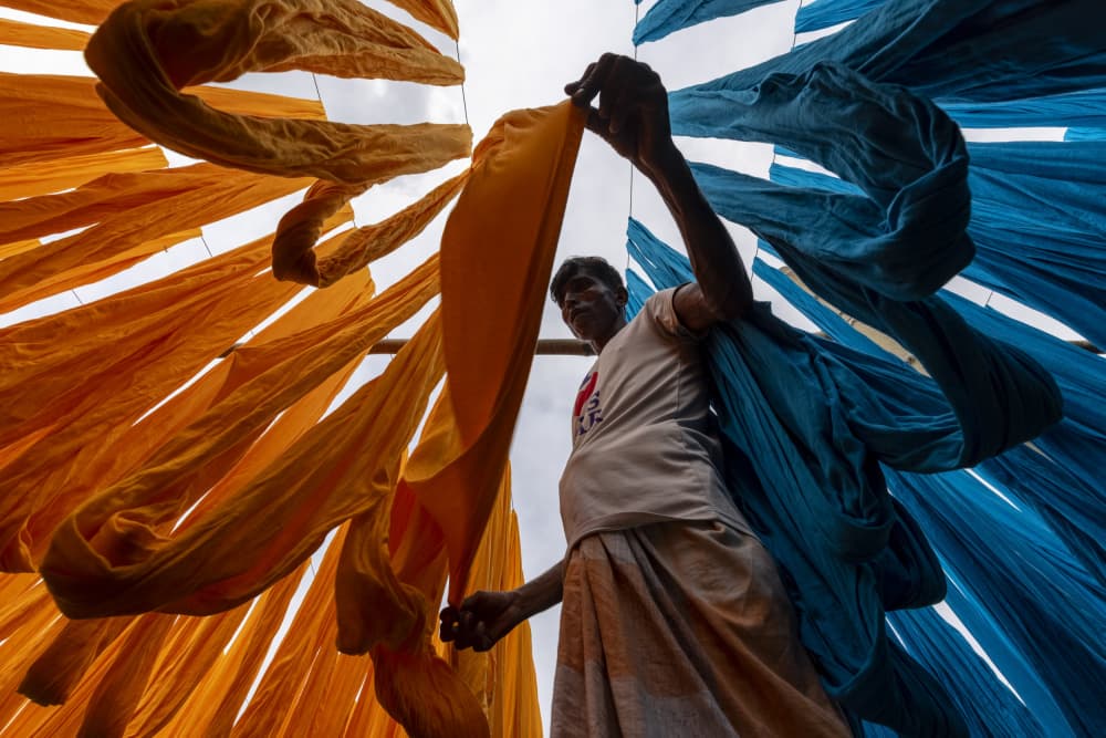 Drying Colorful Fabrics by Azim Khan Ronnie — canvas wall art