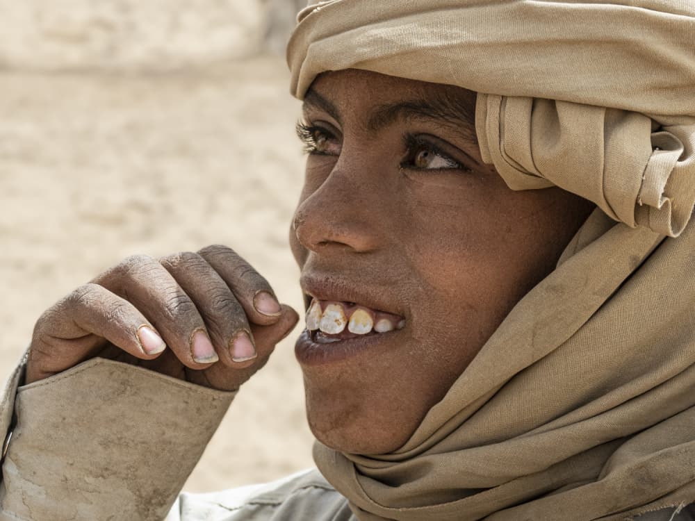 Smiling Desert Boy by Elena Molina — canvas wall art