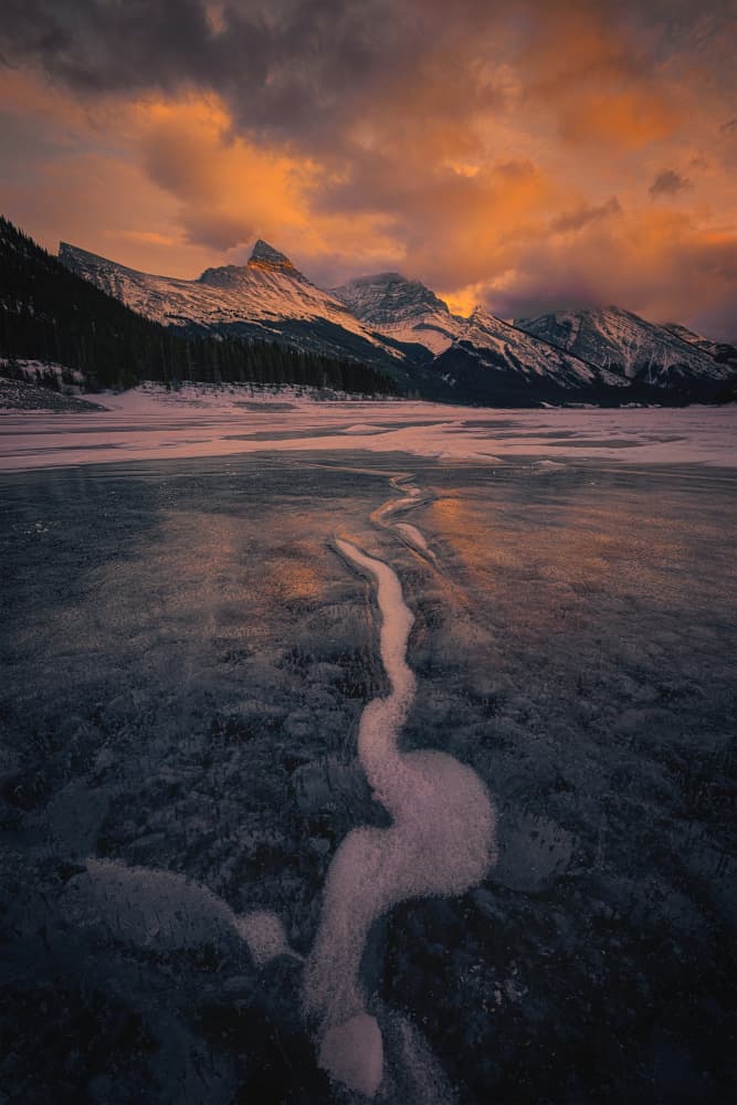 Frozen Lake Mountain Sunset by Lydia Jacobs — canvas wall art