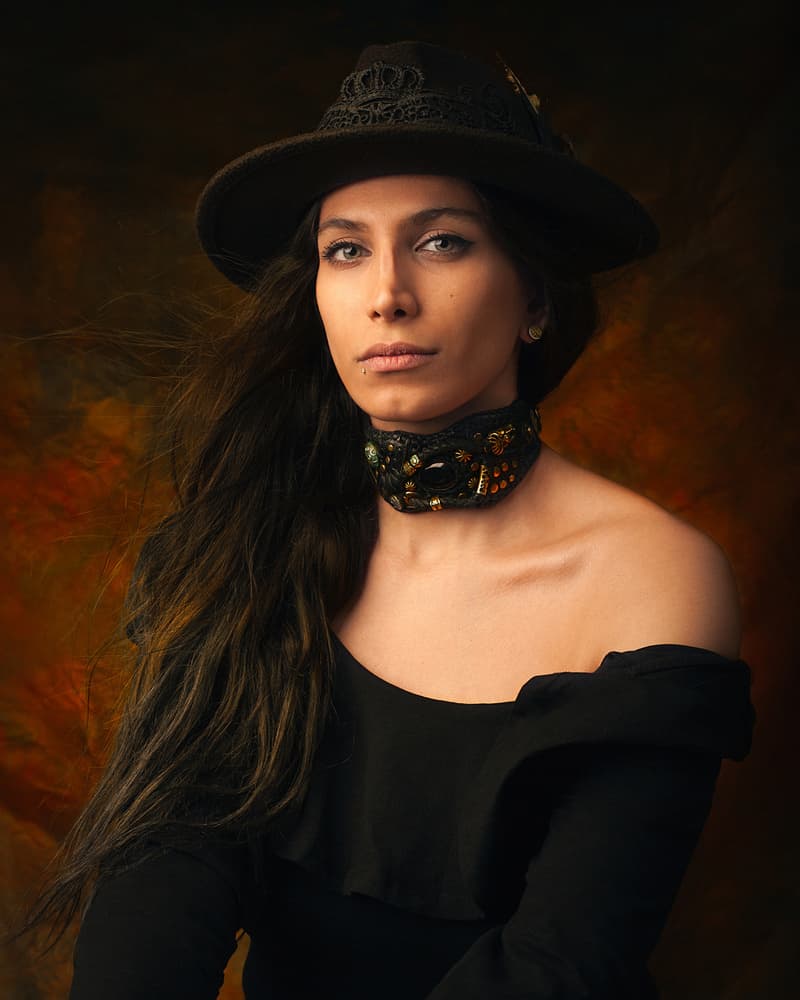 Elegant Woman Dark Hat by Mehdi Mokhtari — canvas wall art