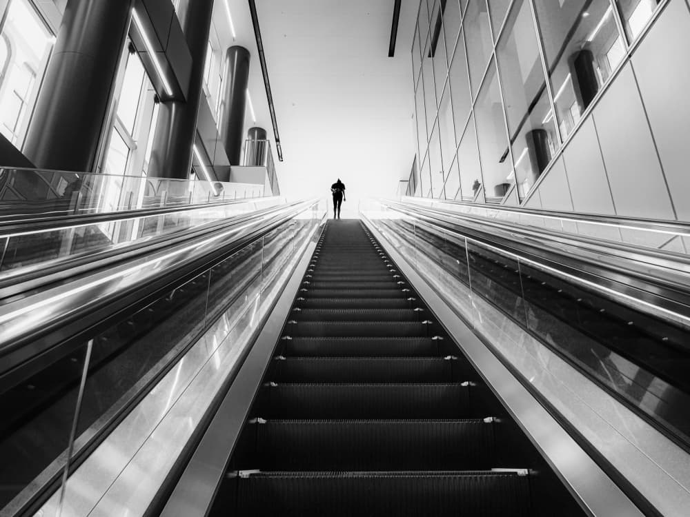 Solitary Escalator Journey by IKUMI FUKAZAWA — canvas wall art