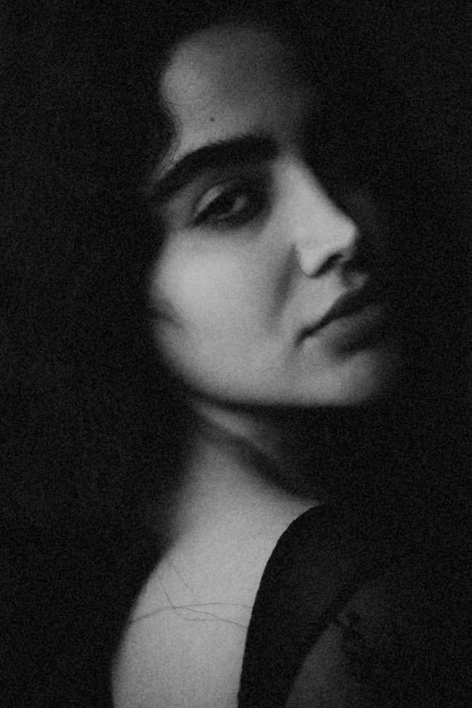 Elegant Shadowed Gaze by Mehdi Mokhtari — canvas wall art