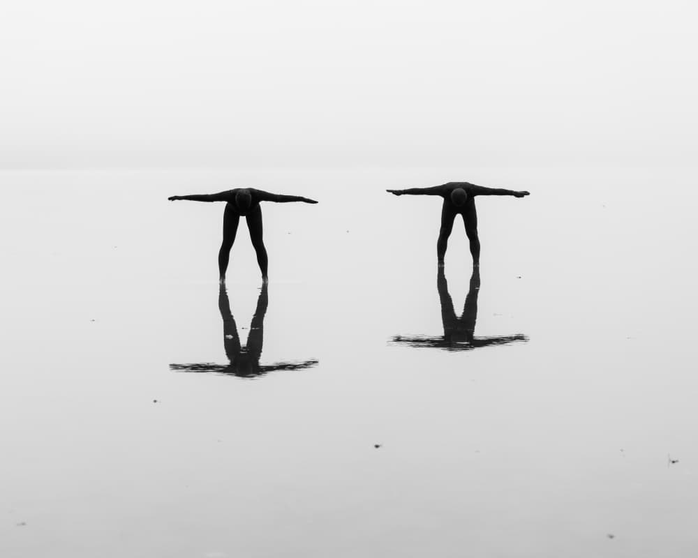 Twin Silhouettes on Water by Leszek Paradowski — canvas wall art