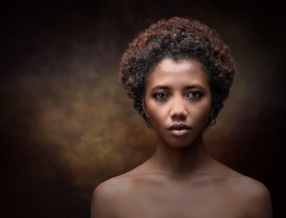 Contemplative Woman Portrait by Luc Stalmans — canvas wall art
