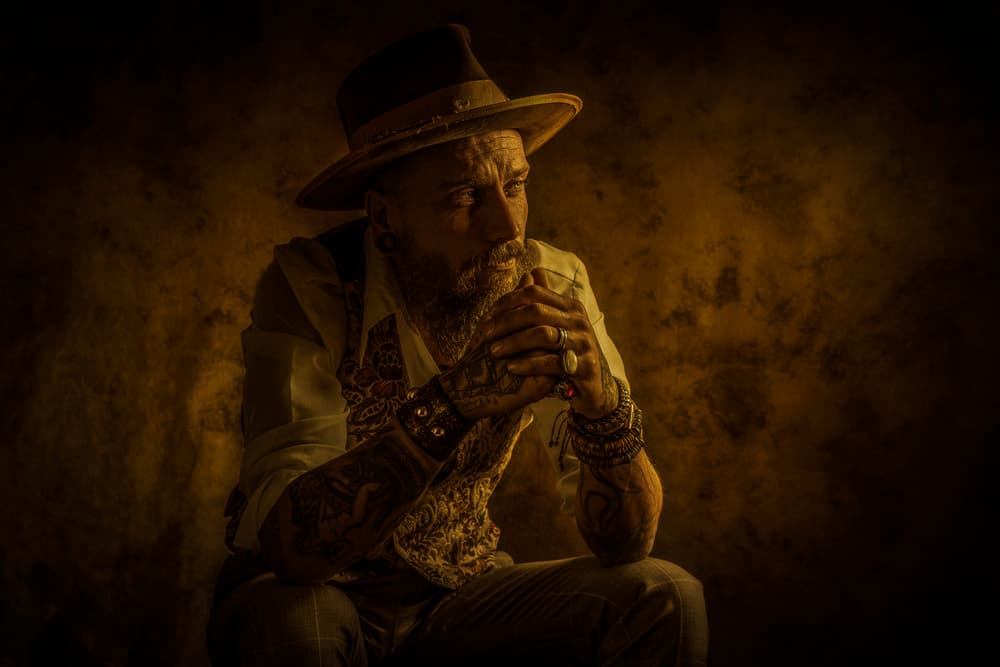Pensive Man in Hat by gNo — canvas wall art