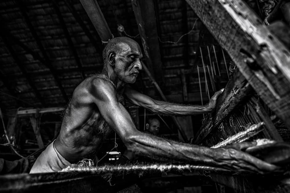Indian Weaver at Loom by Marco Tagliarino — canvas wall art