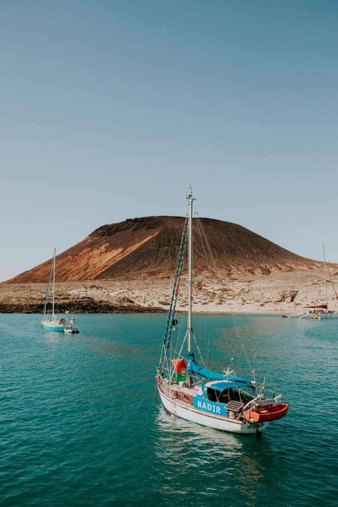 Volcanic Island Sailboats by Claudia Casal — canvas wall art