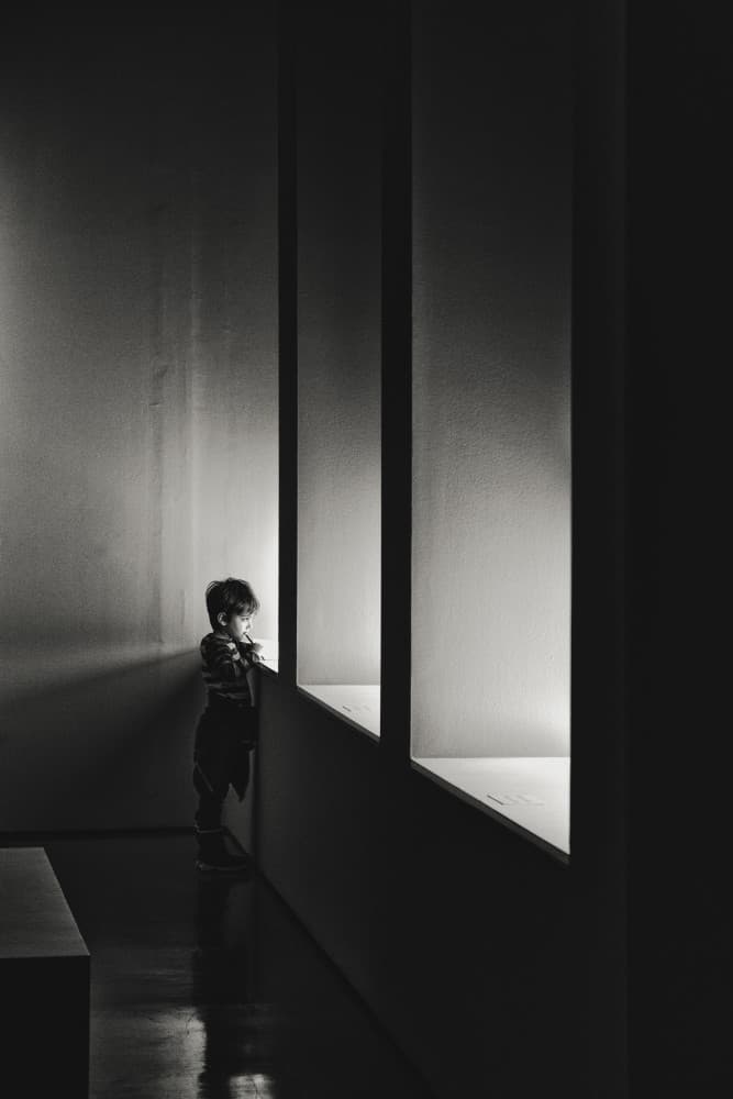 Contemplative Boy Window by Alexander Jikharev — canvas wall art