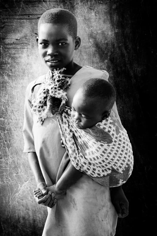 African Sister And Baby by Antonio Grambone — canvas wall art