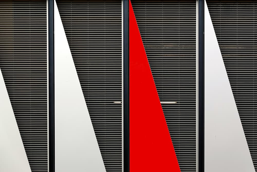 Red Geometric Facade by Hans-Wolfgang Hawerkamp — canvas wall art