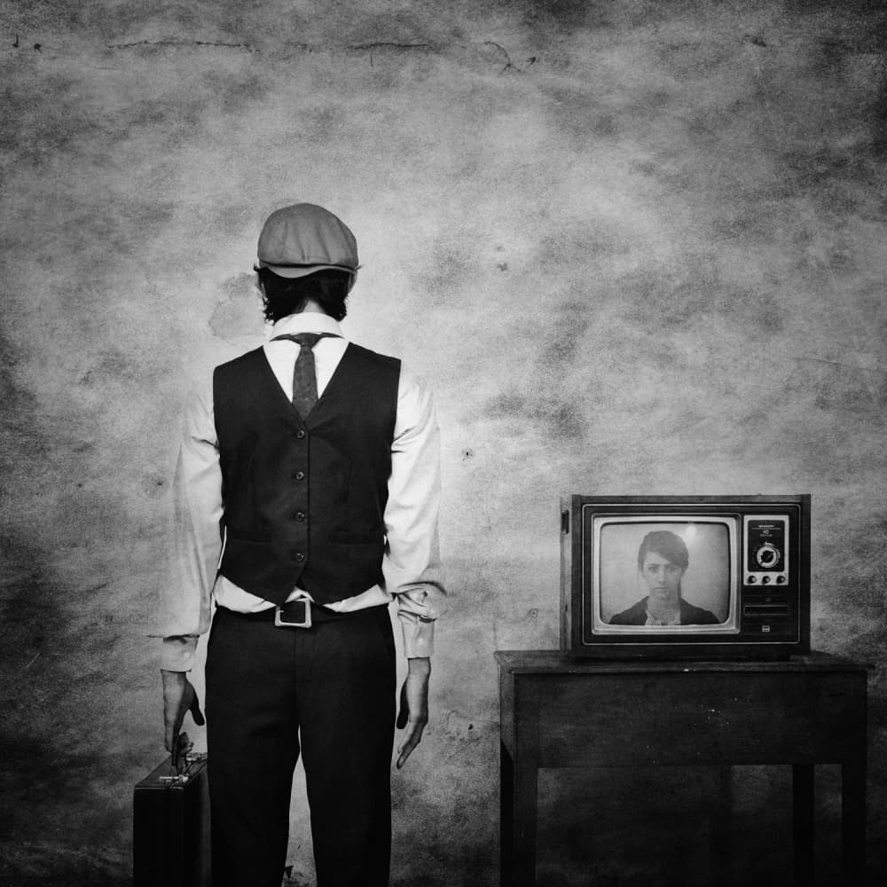 Man and Vintage Television by Jay Satriani — canvas wall art