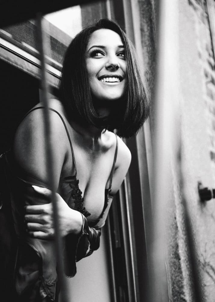 Smiling Woman at Window by Tyler McAuley — canvas wall art