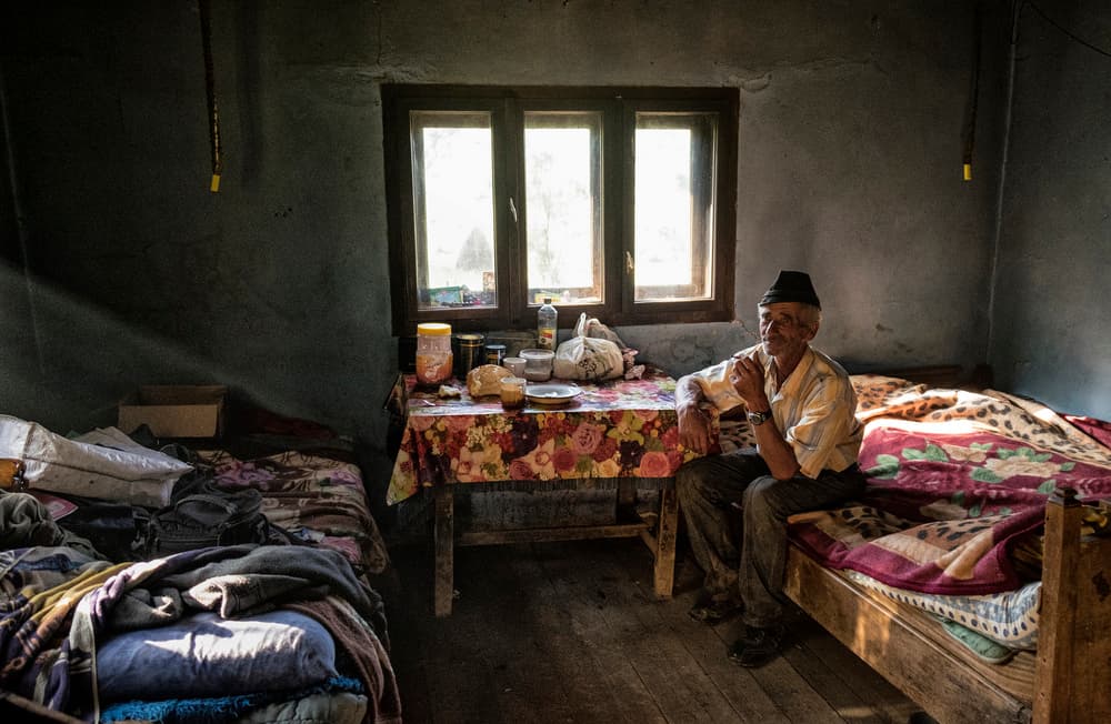 Elderly Man Rustic Home by Andrei Nicolas - The Traveler — canvas wall art