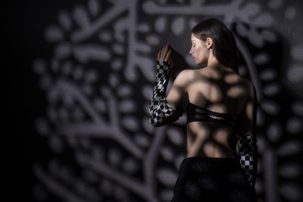 Woman in Shadow Play by Songlin Xu — canvas wall art
