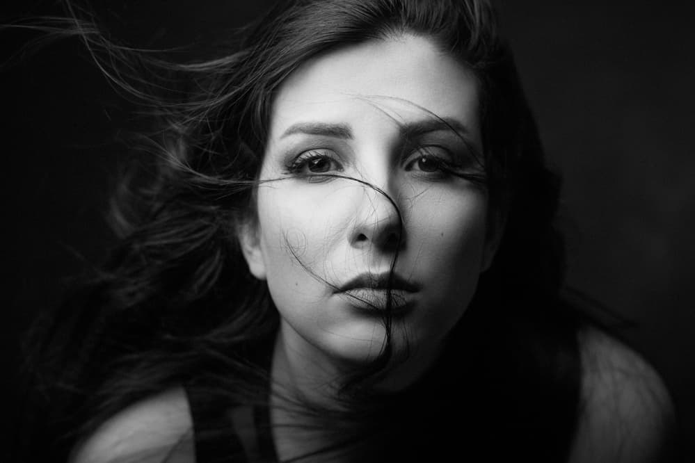Black White Windswept Woman by Mehdi Mokhtari — canvas wall art