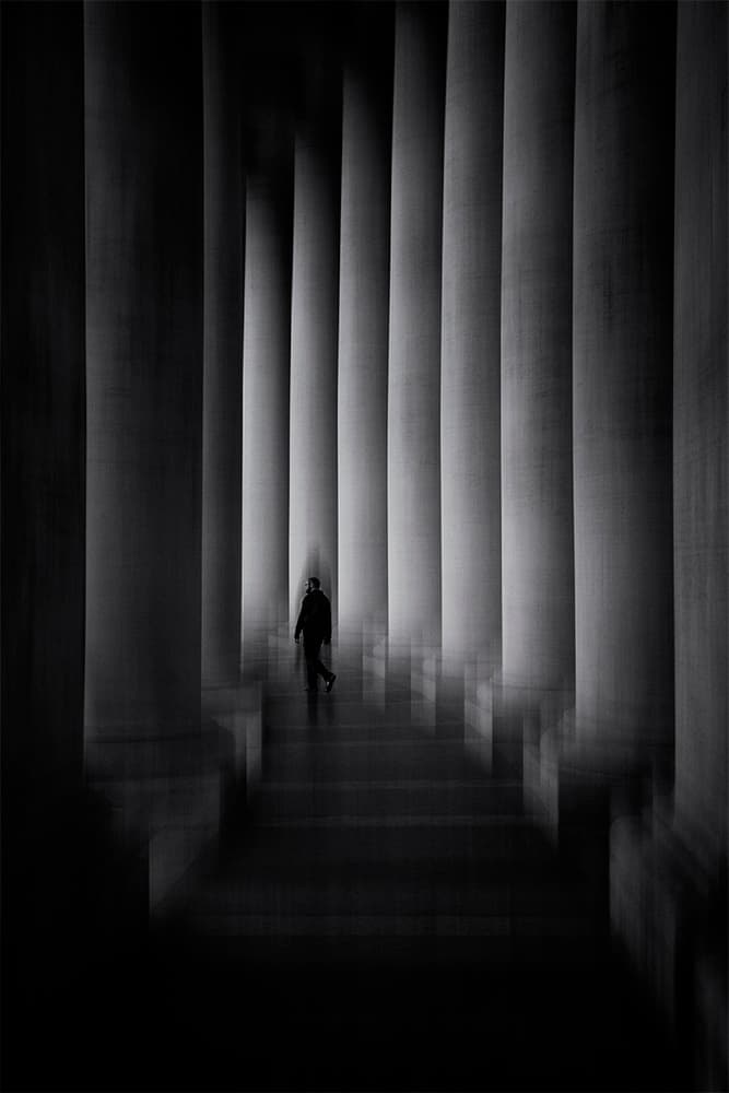 Man in Shadowed Hall by Massimo Della Latta — canvas wall art